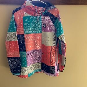 Women’s DC hoodie. Multi colored bandanna pattern. Size medium.